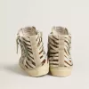 Slide-Sneaker für Damen aus Ponyfell mit Zebradruck und grünem Laminatleder-Detail