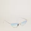 Sonnenbrille im Cat-Eye-Stil mit silbernem Rahmen und blauen Gläsern