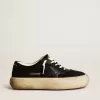 Space-Star-Schuhe aus schwarzem Nylon mit schwarzem Lederstern und Fersenlasche