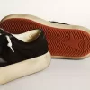 Space-Star-Schuhe aus schwarzem Nylon mit schwarzem Lederstern und Fersenlasche