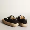 Space-Star-Schuhe aus schwarzem Nylon mit schwarzem Lederstern und Fersenlasche