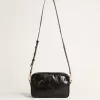 Star Bag aus glänzendem schwarzem Leder mit Ton-in-Ton-Stern