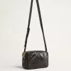 Star Bag aus glänzendem schwarzem Leder mit Ton-in-Ton-Stern