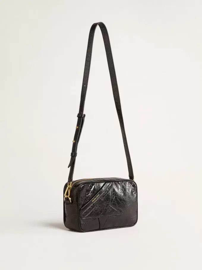Star Bag aus glänzendem schwarzem Leder mit Ton-in-Ton-Stern
