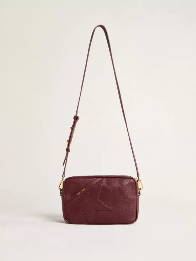 Star Bag aus weinrotem Leder mit farblich abgestimmtem Stern