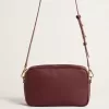Star Bag aus weinrotem Leder mit farblich abgestimmtem Stern