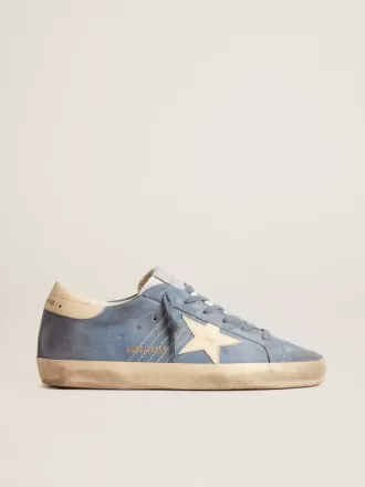 Super-Star aus hellblauem Wildleder mit beigem Lederstern und Fersenlasche Super-Star aus hellblauem Wildleder mit beigem Lederstern und Fersenlasche