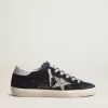 Super-Star für Damen aus blauem Wildleder, mit silbernem Glitzerstern und Lederlasche am Absatz Super-Star für Damen aus blauem Wildleder, mit silbernem Glitzerstern und Lederlasche am Absatz
