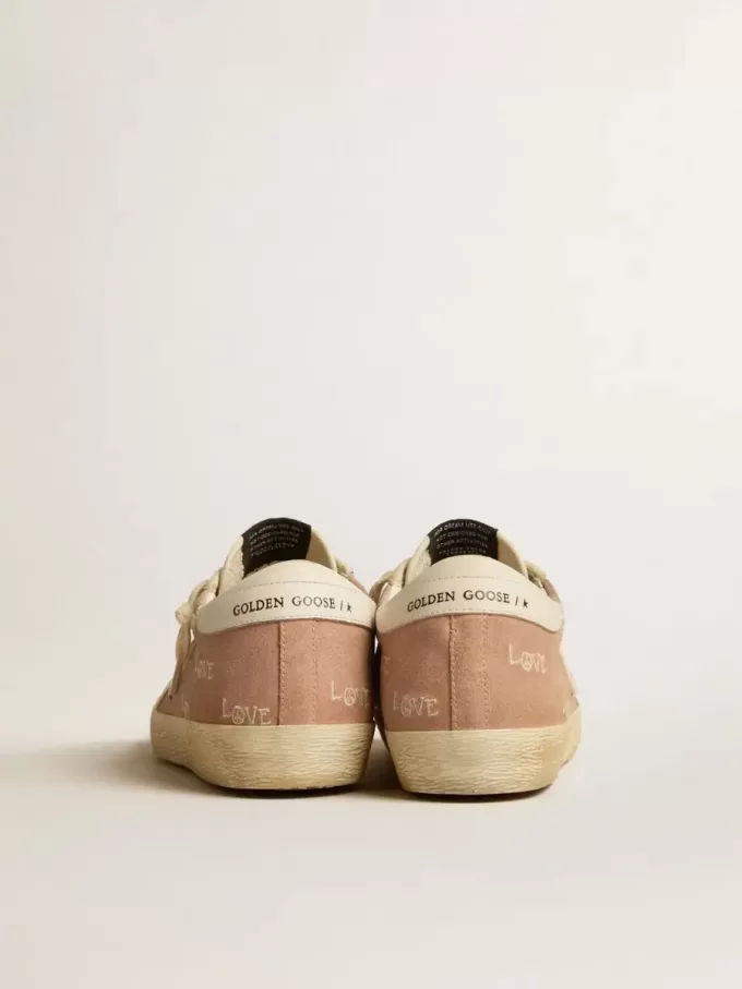 Super-Star für Damen aus puderrosa Wildleder mit cremefarbenem Lederstern Super-Star für Damen aus puderrosa Wildleder mit cremefarbenem Lederstern