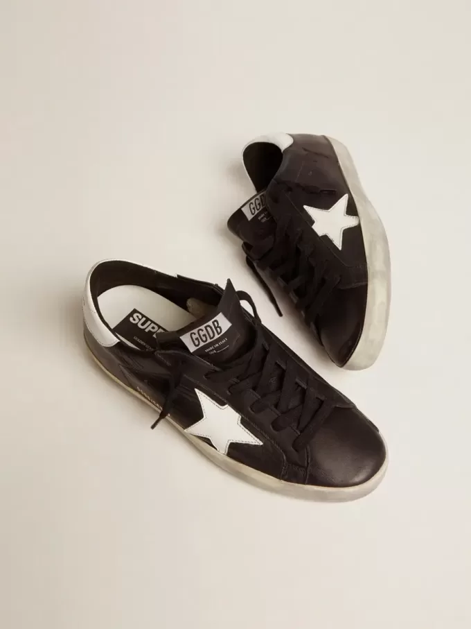 Super-Star für Damen aus schwarzem Leder mit weißem Lederstern und Fersenlasche