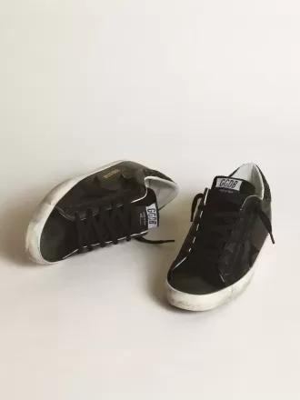 Super-Star für Damen aus schwarzem Nappaleder mit schwarzem Stern und glitzernder Fersenlasche Super-Star für Damen aus schwarzem Nappaleder mit schwarzem Stern und glitzernder Fersenlasche