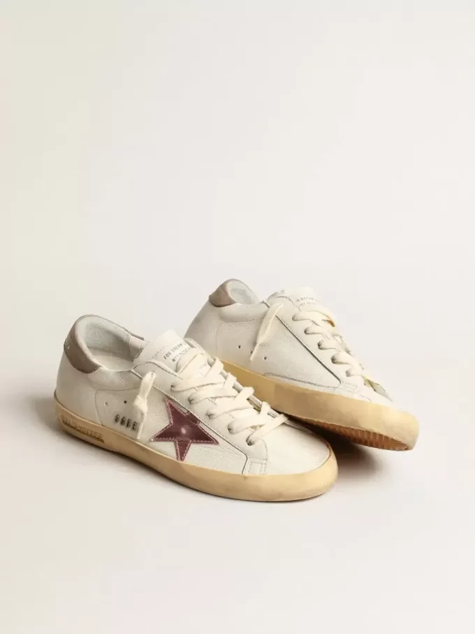 Super-Star für Damen aus weißem Nappaleder mit rosa Metallic-Lederstern Super-Star für Damen aus weißem Nappaleder mit rosa Metallic-Lederstern