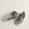 Super Star für Damen mit glitzerndem Obermaterial und silbernem Metallic-Lederstern Super Star für Damen mit glitzerndem Obermaterial und silbernem Metallic-Lederstern