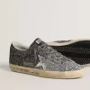 Super Star für Damen mit glitzerndem Obermaterial und silbernem Metallic-Lederstern Super Star für Damen mit glitzerndem Obermaterial und silbernem Metallic-Lederstern