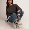 Super-Star für Damen mit goldglitzerndem Foxing und Metallnieten-Schriftzug