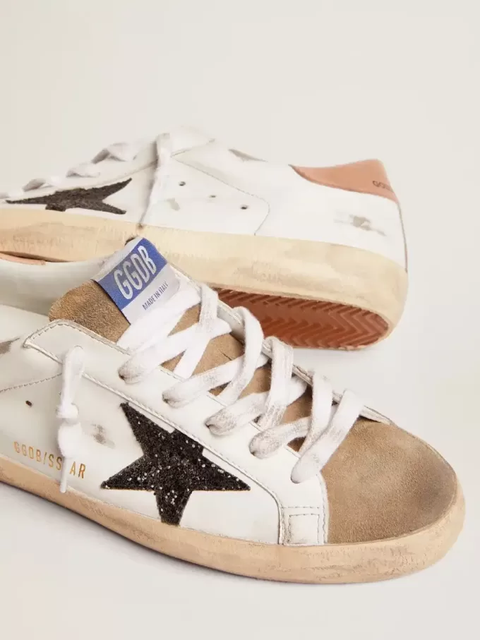 Super-Star für Damen mit schwarzem Glitzerstern und rosa Fersenlasche Super-Star für Damen mit schwarzem Glitzerstern und rosa Fersenlasche
