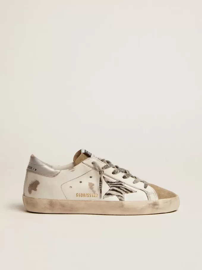 Super-Star für Damen mit Zebra-Print und Ponyfell-Stern Super-Star für Damen mit Zebra-Print und Ponyfell-Stern