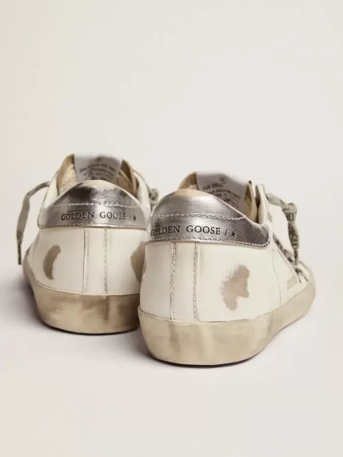 Super-Star für Damen mit Zebra-Print und Ponyfell-Stern Super-Star für Damen mit Zebra-Print und Ponyfell-Stern