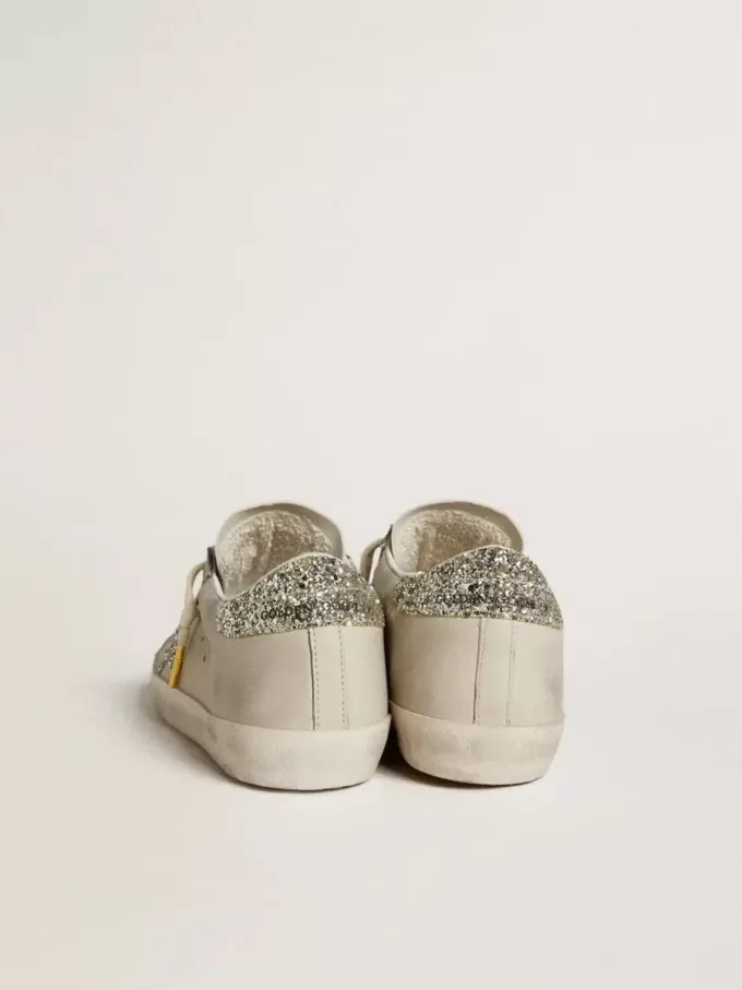 Super-Star LTD für Damen aus elfenbeinfarbenem Nappaleder mit platinfarbenem Glitzerstern und Fersenlasche