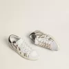 Super-Star LTD für Damen aus weißem Ponyfell mit braunem Glitzer und weißem Wildlederstern Super-Star LTD für Damen aus weißem Ponyfell mit braunem Glitzer und weißem Wildlederstern