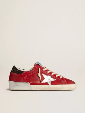 Super-Star LTD für Damen in rotem Nubukleder mit Lederstern und glitzernder Fersenlasche Super-Star LTD für Damen in rotem Nubukleder mit Lederstern und glitzernder Fersenlasche