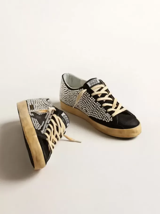 Super-Star LTD mit Swarovski-Kristallen und schwarzem Lederstern Super-Star LTD mit Swarovski-Kristallen und schwarzem Lederstern