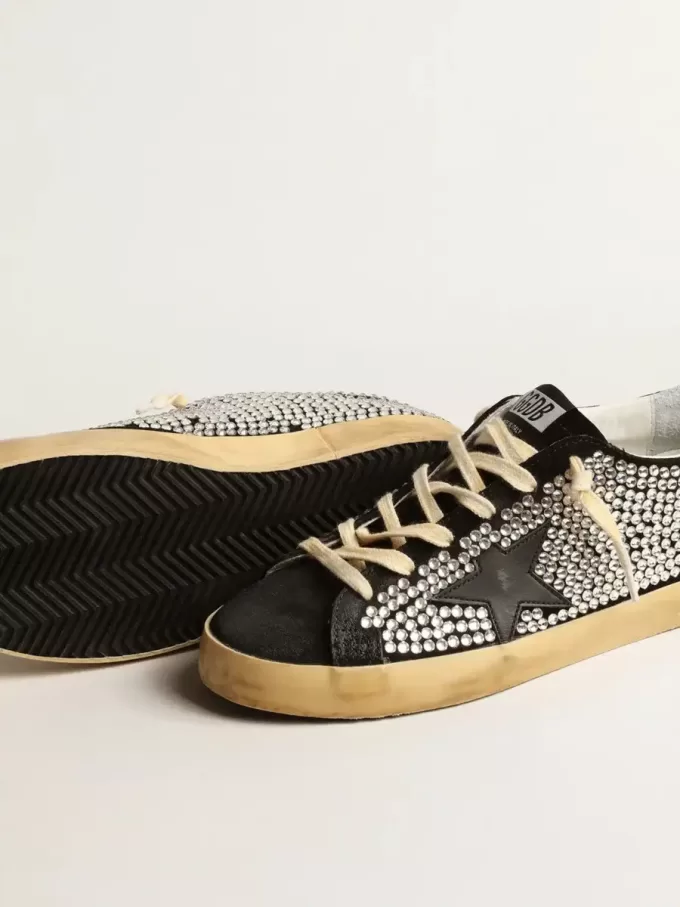 Super-Star LTD mit Swarovski-Kristallen und schwarzem Lederstern Super-Star LTD mit Swarovski-Kristallen und schwarzem Lederstern