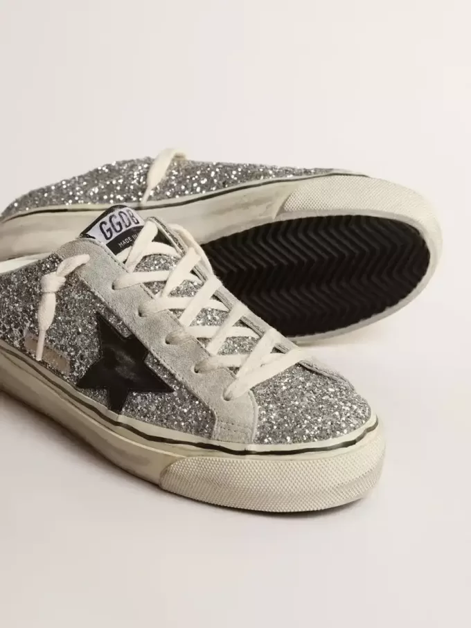 Super-Star Sabot für Damen in silbernem Glitzer mit schwarzem Lederstern