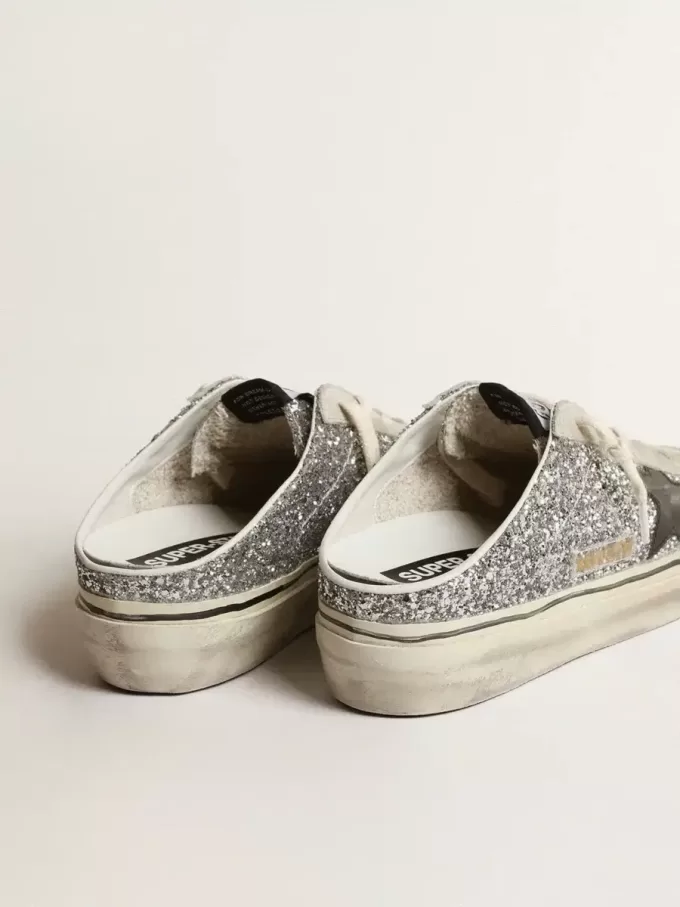 Super-Star Sabot für Damen in silbernem Glitzer mit schwarzem Lederstern