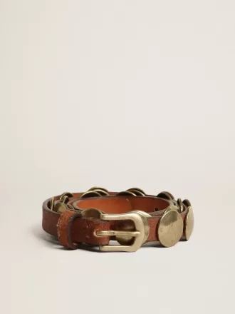 Trinidad-Gürtel aus gealtertem hellbraunem Leder mit goldenen Maxi-Nieten Trinidad-Gürtel aus gealtertem hellbraunem Leder mit goldenen Maxi-Nieten