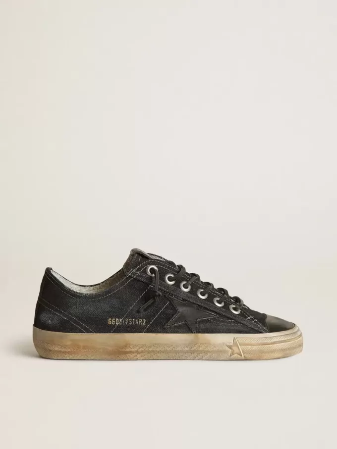 V-Star aus mitternachtsblauem Denim mit schwarzem Lederstern und Zehenkappe V-Star aus mitternachtsblauem Denim mit schwarzem Lederstern und Zehenkappe