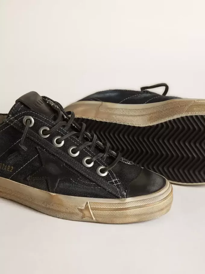 V-Star aus mitternachtsblauem Denim mit schwarzem Lederstern und Zehenkappe V-Star aus mitternachtsblauem Denim mit schwarzem Lederstern und Zehenkappe