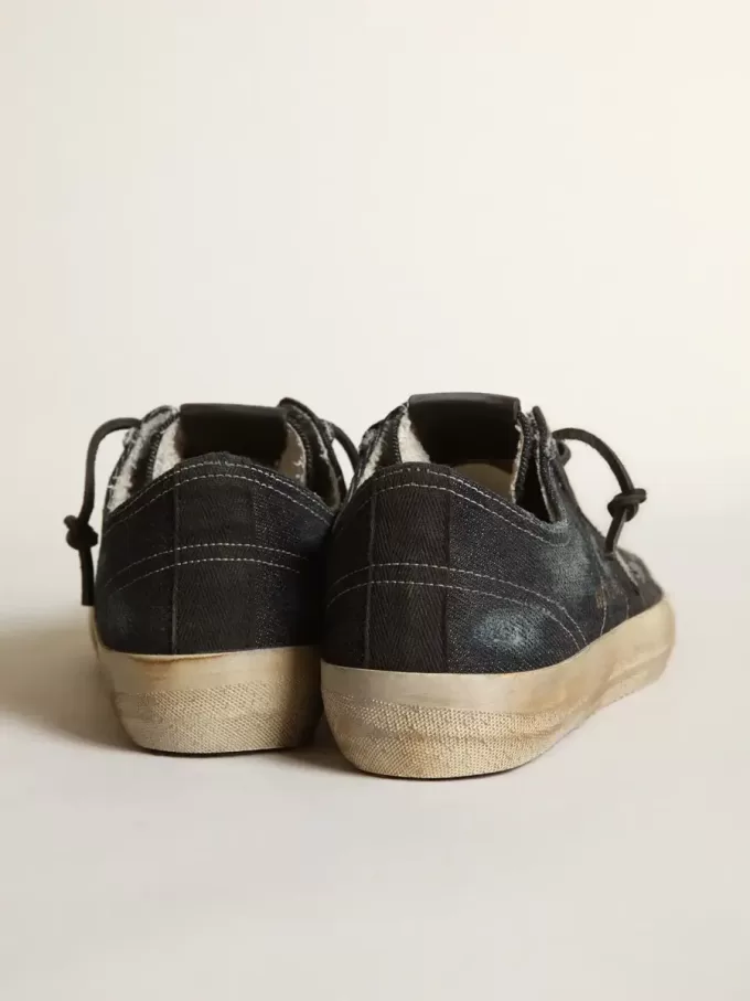 V-Star aus mitternachtsblauem Denim mit schwarzem Lederstern und Zehenkappe V-Star aus mitternachtsblauem Denim mit schwarzem Lederstern und Zehenkappe