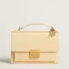 Venezia Tasche aus beigem Leder mit Python-Print und goldenen Details