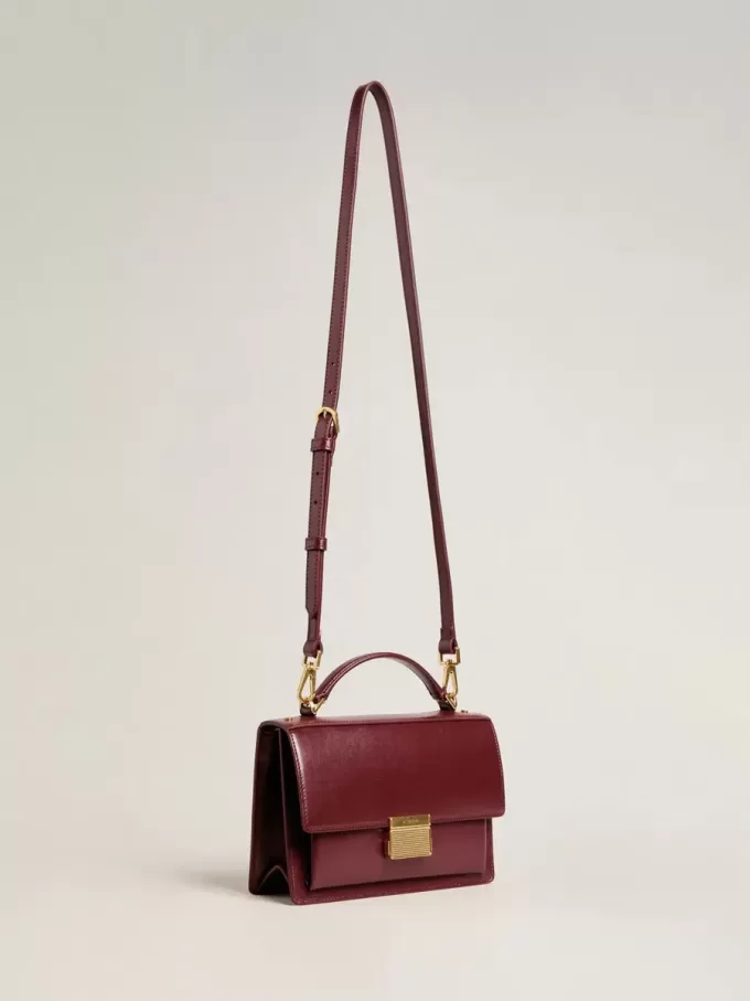 Venezia Tasche aus burgunderrotem Leder mit Golddetails