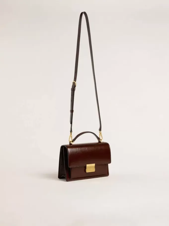 Venezia Tasche aus dunkelbraunem laminiertem Leder mit goldenen Details