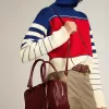 Vita Bag aus burgunderrotem Leder mit goldenen Details