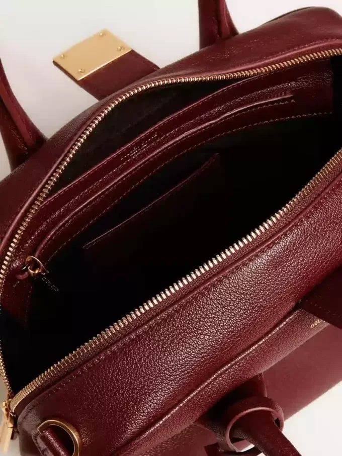 Vita Bag aus burgunderrotem Leder mit goldenen Details