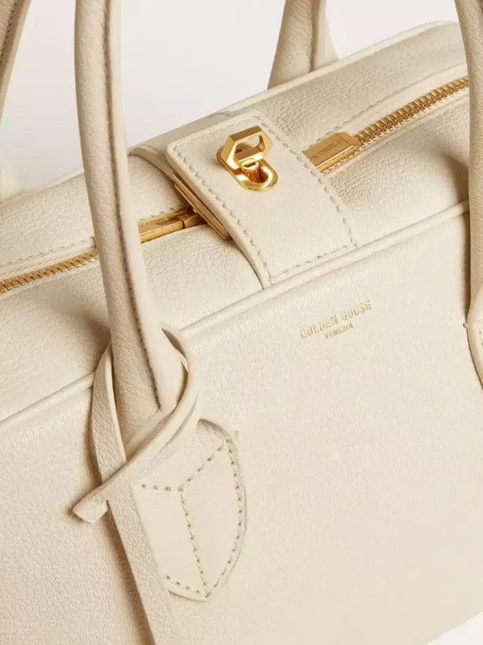 Vita Bag aus butterfarbenem Leder mit goldenen Details