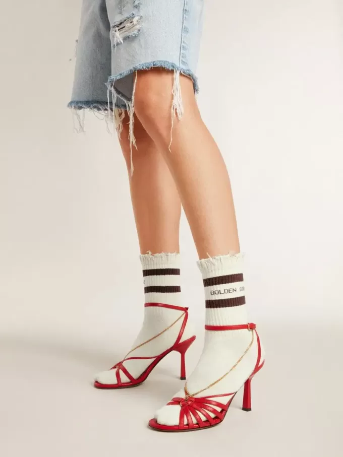 Weiß getrunkene Socken mit Used-Details und braunen Streifen