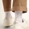 Weiße Socken mit Kristallstern auf der Rückseite