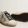 Weiße Super-Star-Damenschuhe aus Leder mit glitzernder Fersenlasche Weiße Super-Star-Damenschuhe aus Leder mit glitzernder Fersenlasche