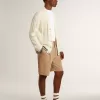 Weißer Baumwollcardigan für Herren mit Zopfmuster und blauen Rippbündchen