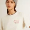Weißes Baumwoll-T-Shirt für Damen mit Handstickerei Weißes Baumwoll-T-Shirt für Damen mit Handstickerei