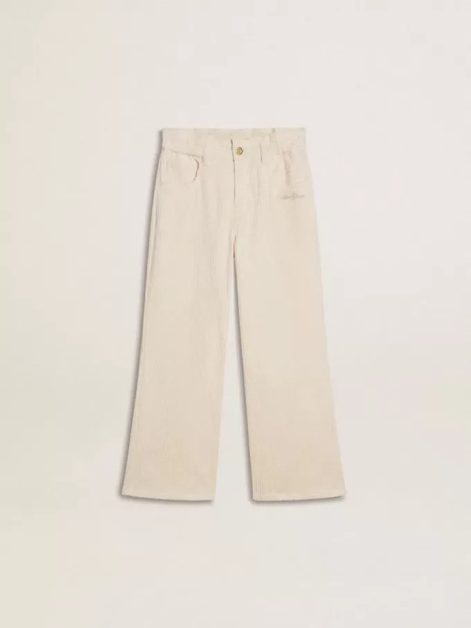 Weite, cremefarbene Mädchenhose mit Rippstrick und Stickerei