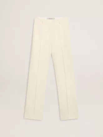 Weite Damenhose aus abgenutztem, weißem Stoff