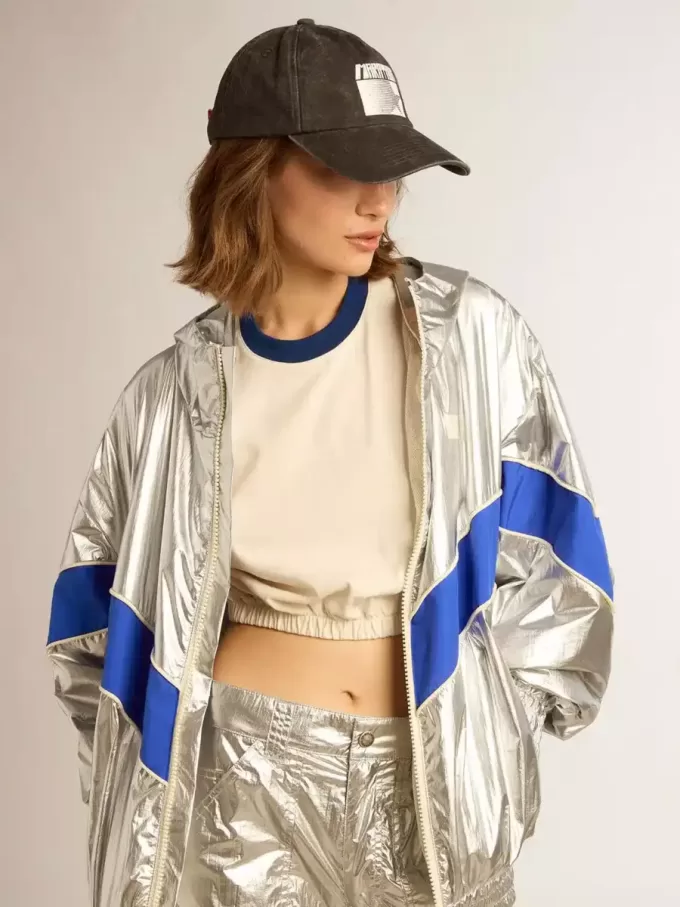 Windjacke für Damen aus silbernem Funktionsmaterial Windjacke für Damen aus silbernem Funktionsmaterial