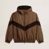 Windjacke in Beige und Schwarz mit Hahnentrittmuster