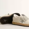 Young Ball Star aus Nappa mit silbernem Glitzerstern und Fersenlasche Young Ball Star aus Nappa mit silbernem Glitzerstern und Fersenlasche